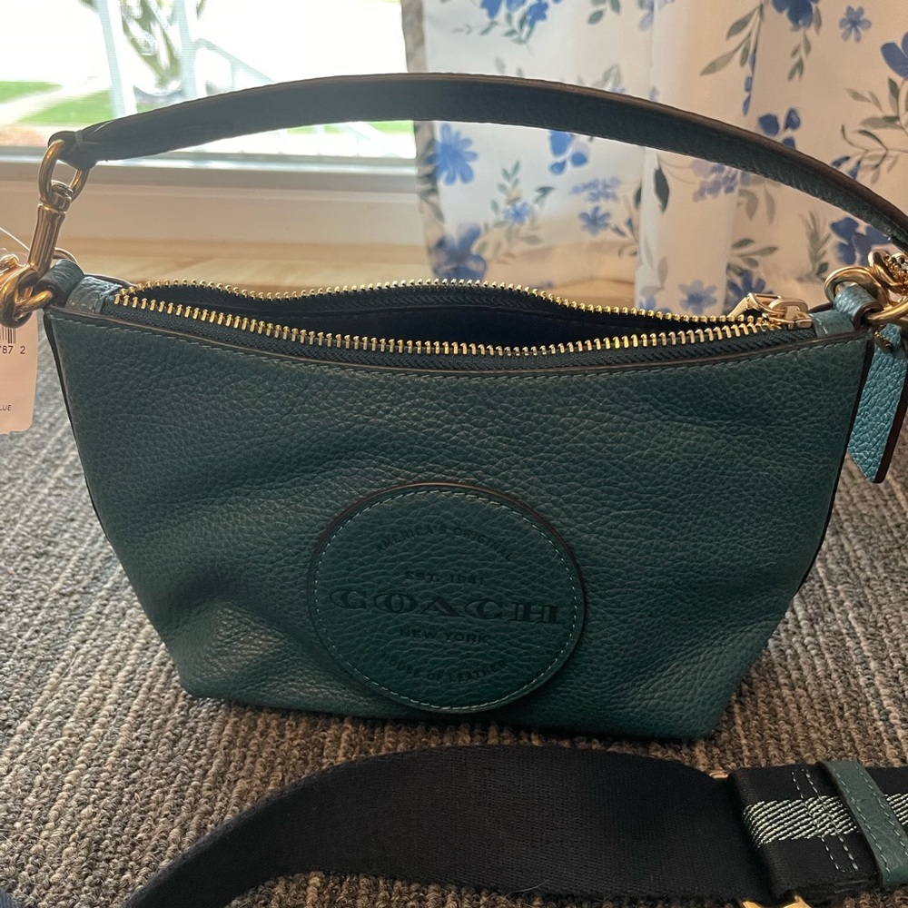 Coach small teal handbag